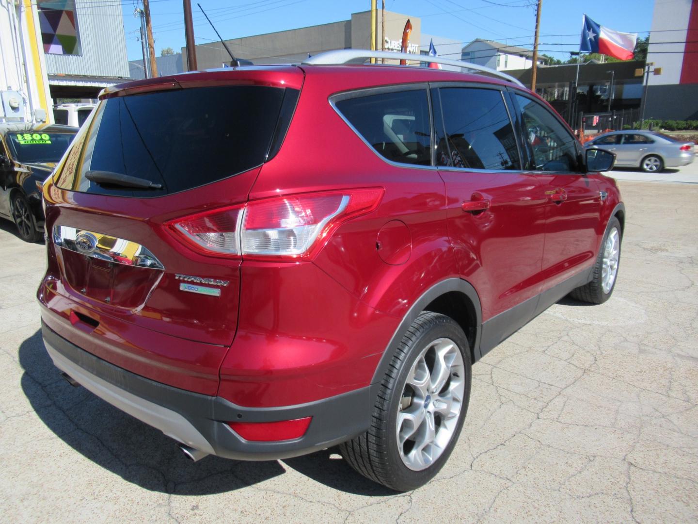 2014 Red /Black Ford Escape Titanium (1FMCU0J98EU) with an 2.0 engine, Automatic transmission, located at 1511 North Shepherd Dr., Houston, TX, 77008, (281) 657-1221, 29.798361, -95.412560 - 2014 FORD ESCAPE TITANIUM VIN: 1FMCU0J98EUA29272 1 F M C U 0 J 9 8 E U A 2 9 2 7 2 4 DOOR WAGON/SPORT UTILITY 2.0L I4 F DOHC 16V GASOLINE FRONT WHEEL DRIVE - Photo#22